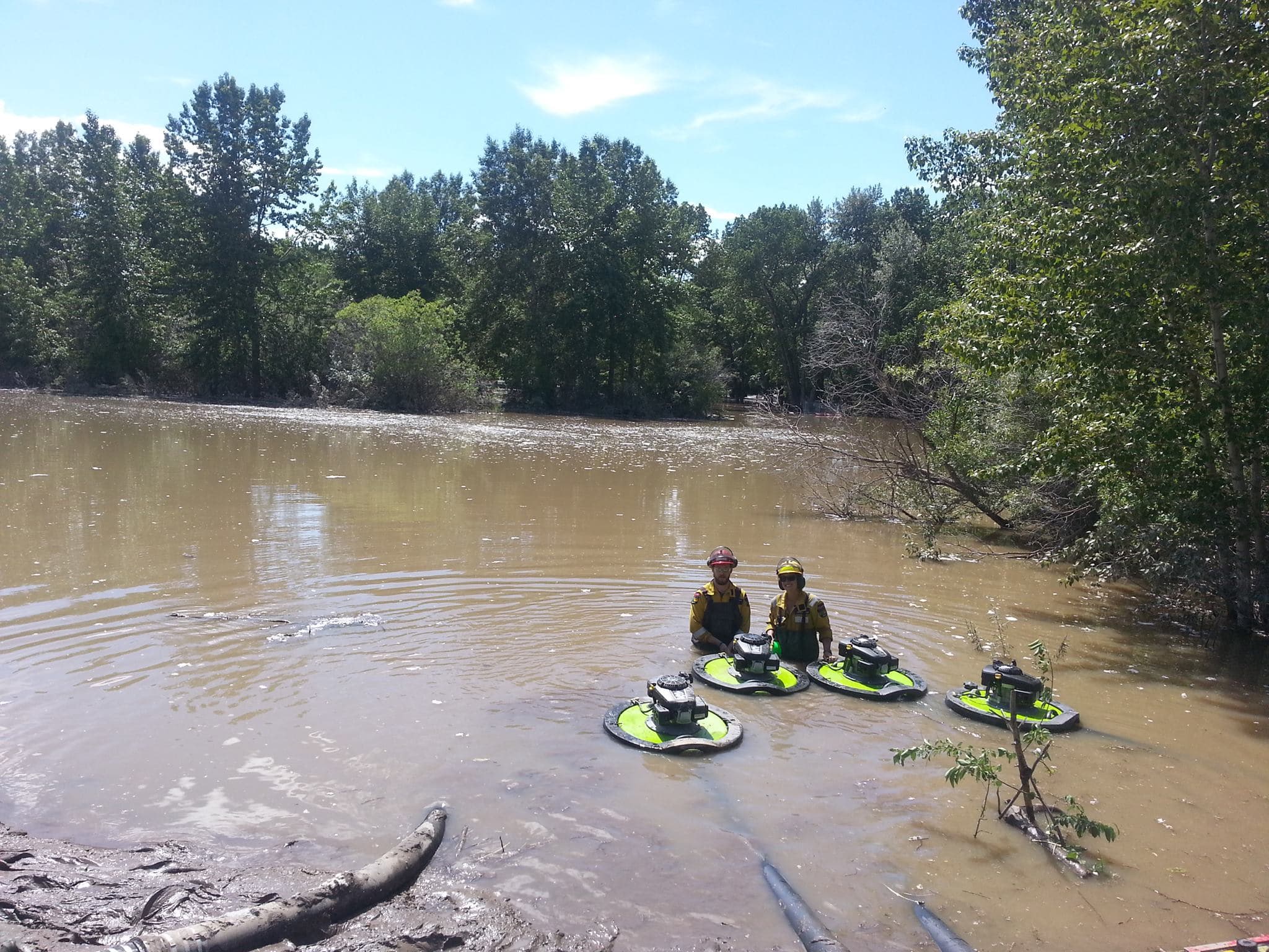 High river flood drained this within 24 hours — Warthog pump job — High River, AB